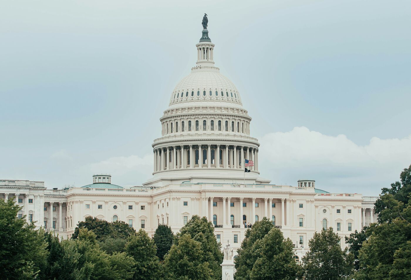 The United States Capitol building under a blue sky