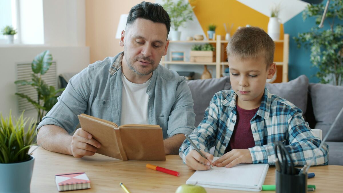 A tutor working one-on-one with a young student